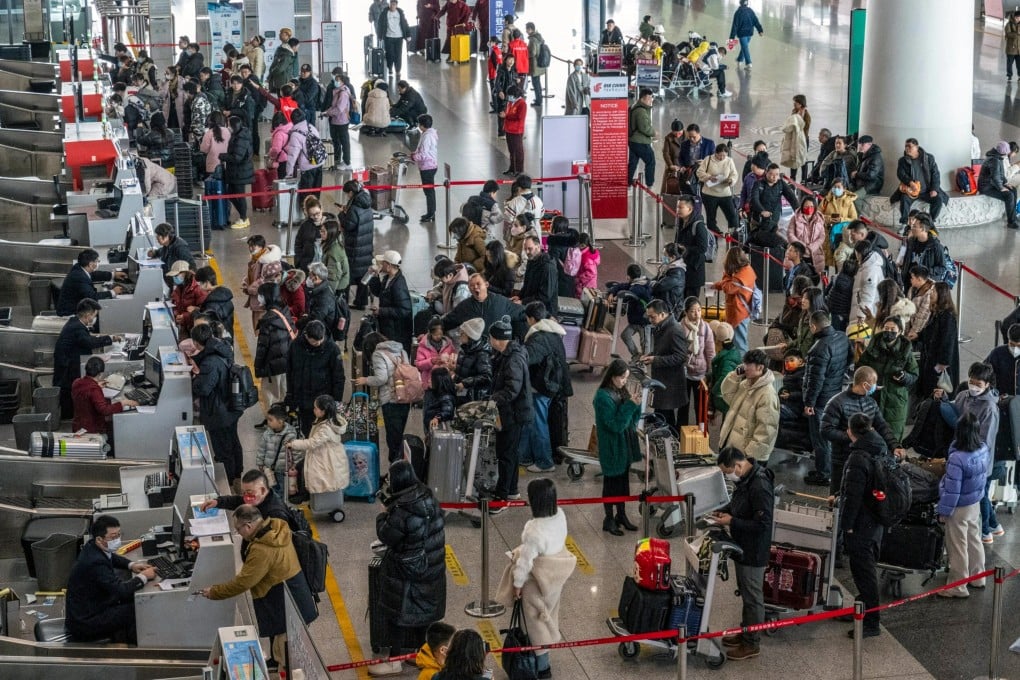 Beijing Capital International Airport is seen packed in the lead-up to the Lunar New Year holiday last month. Photo: Bloomberg