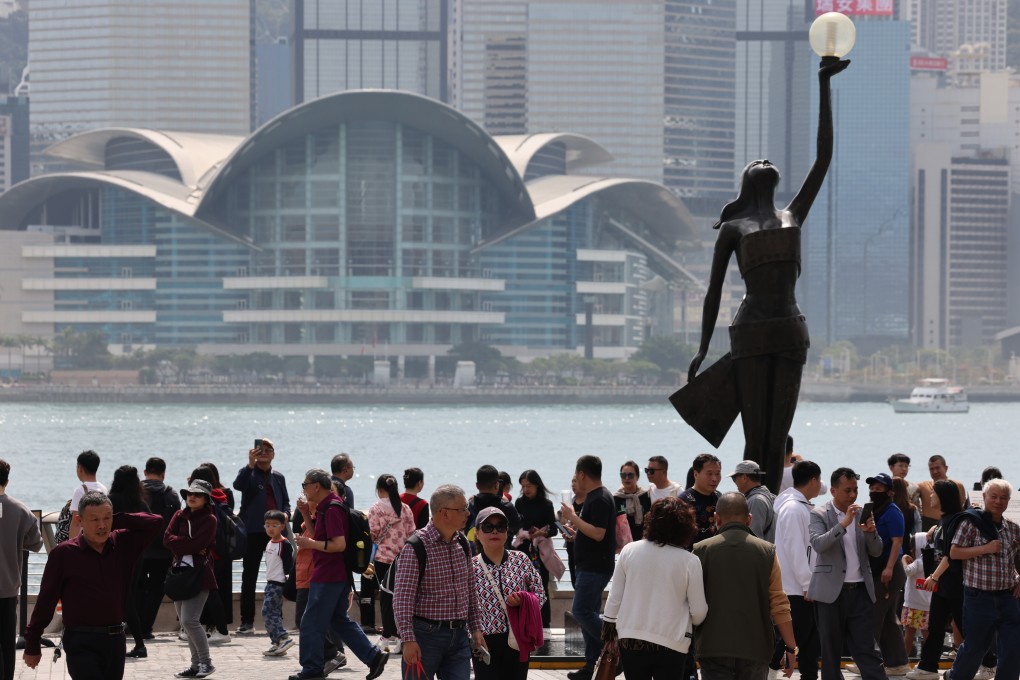 Tourists visit the Avenue of Stars in Tsim Sha Tsui. Photo: Jelly Tse