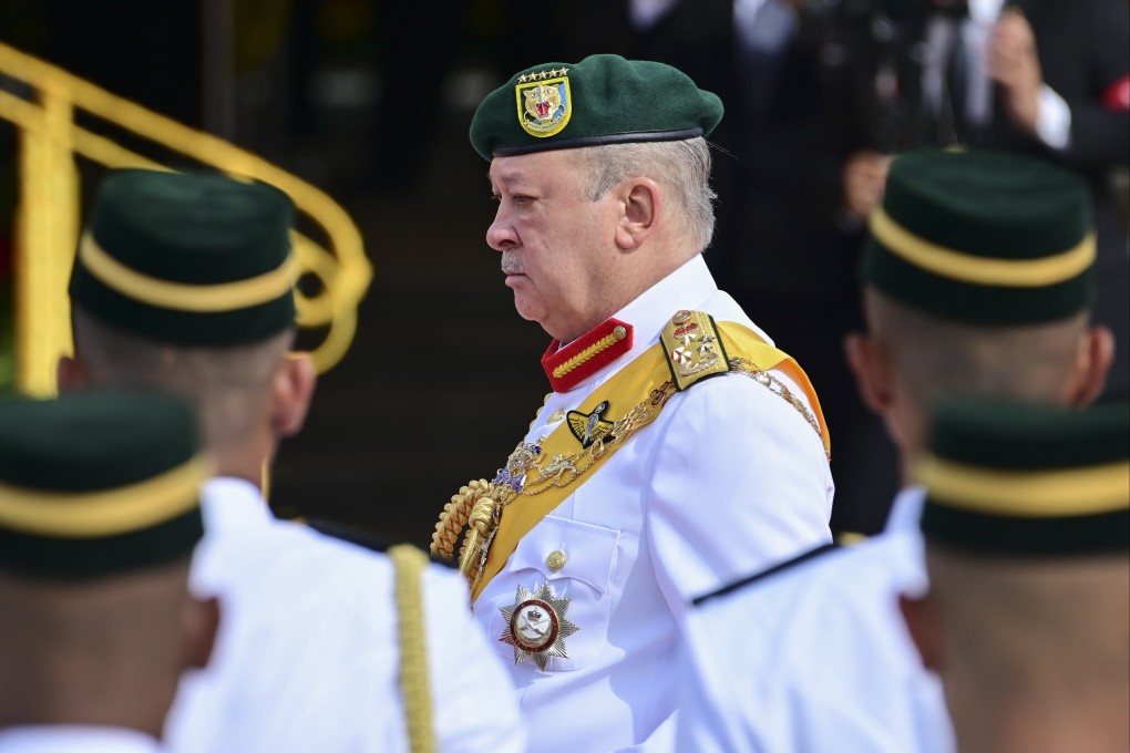 Malaysia’s King Sultan Ibrahim Sultan Iskandar inspects the guard of honour during the opening of the third session of the 15th parliament in Kuala Lumpur. Photo: EPA-EFE