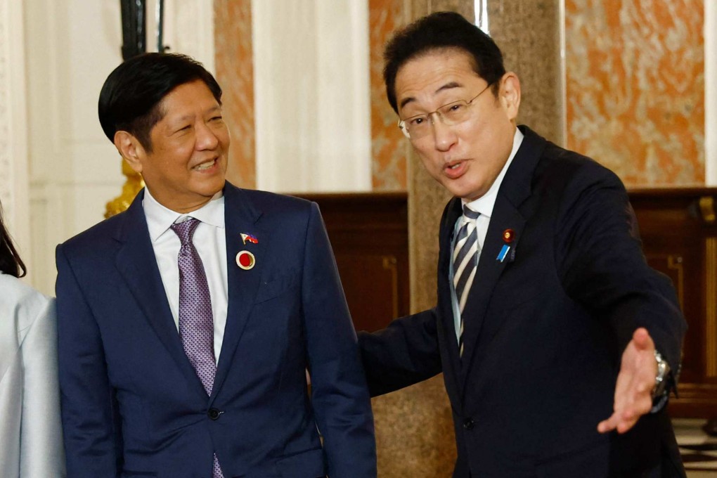 Japan’s Prime Minister Fumio Kishida (right) welcome Philippine President Ferdinand Marcos Jnr (left) at the Tokyo’s Akasaka Palace state guest house in December. Photo: AFP