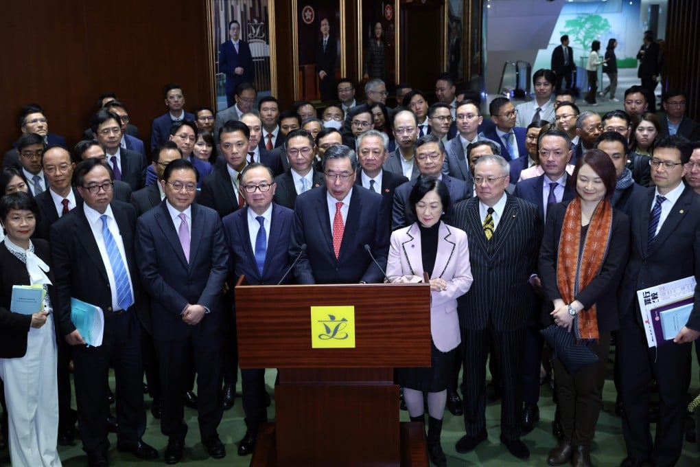 Andrew Leung, the Legco president, and council members after the legislature passed the city’s Article 23 bill. Photo: Yik Yeung-man