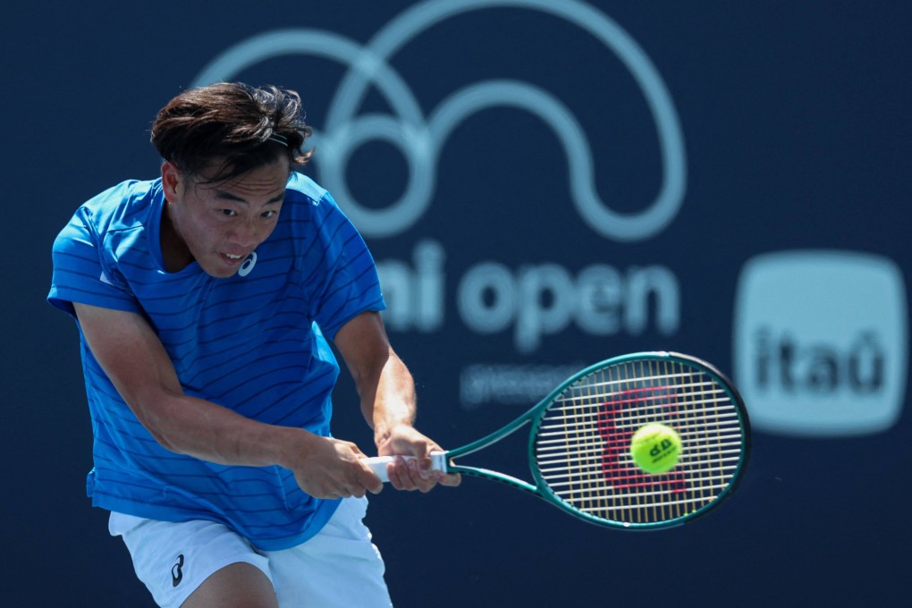 Coleman Wong returns a shot from Sumit Nagal during his men’s singles qualifying match at Hard Rock Stadium. Photo: Getty Images