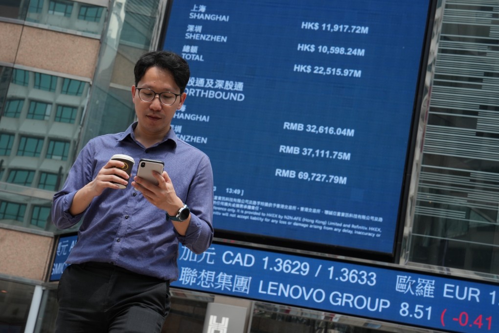 People walk through the piazza in front of the headquarters of Hong Kong Exchanges and Clearing Limited (HKEX), Central. Photo: Elson LI