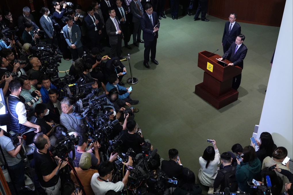 John Lee addresses media after the passing of the Article 23 legislation at Legislative Council. Photo: Eugene Lee