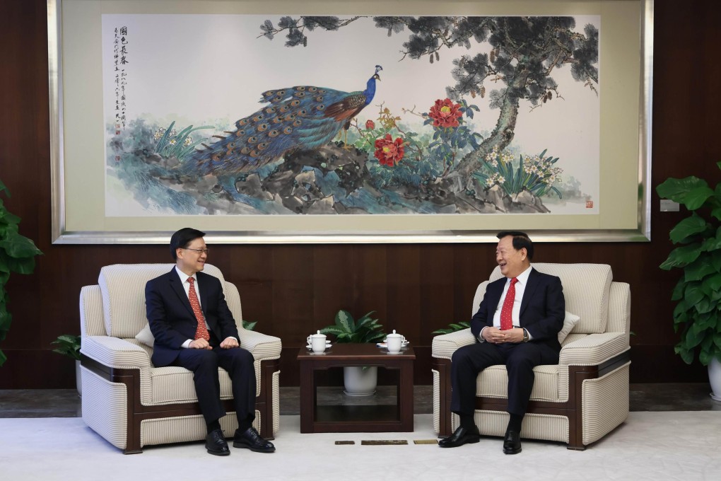 City leader John Lee (left) meets Xia Baolong, director of the Hong Kong and Macau Affairs Office. Photo: Handout