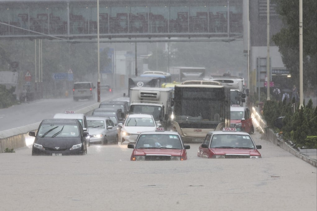 Lung Cheung Road is flooded amid a black rainstorm warning in 2023. More typhoons could hit in 2024. Photo: Edmond So