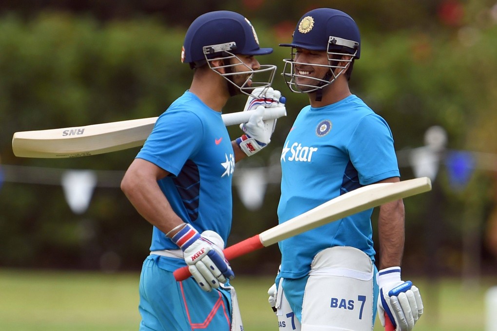 Two of the biggest names in Indian cricket, MS Dhoni (right) and Virat Kolhi, will face each other in the opening match of the Indian Premier League season.  Photo: AFP