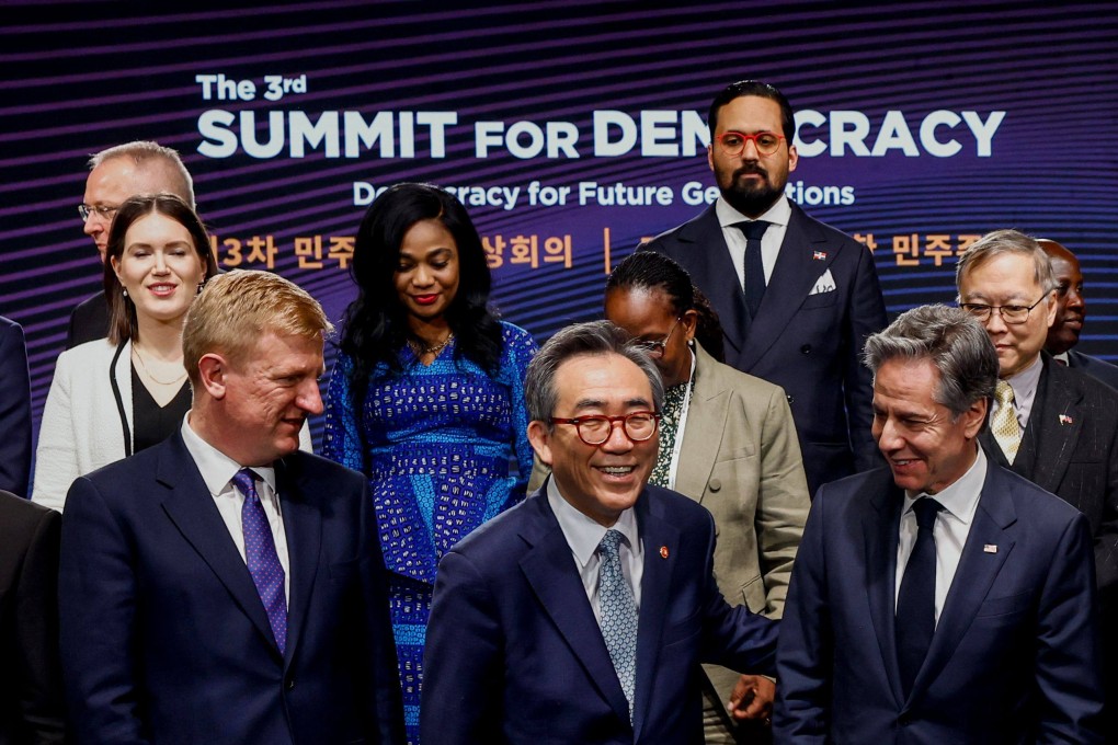 US Secretary of State Antony Blinken (right) speaks with South Korean Foreign Minister Cho Tae-yul as Britain’s Deputy Prime Minister Oliver Dowden looks on at the Summit for Democracy in Seoul. Photo: AFP