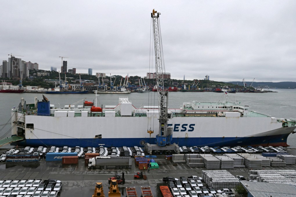 Chinese cars unloaded from a ship at a commercial port in the Russian city of Vladivostok on August 25, 2023. Photo: Reuters.