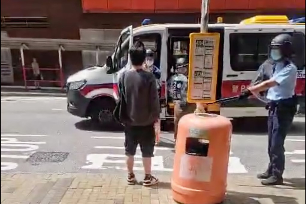 A video posted online shows three officers ordering a man to drop a knife. Photo: Facebook / @ 香港突發報料區