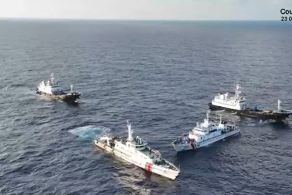Chinese vessels surround the Philippine coastguard ship BRP Cabra (second right) during its supply mission near Second Thomas Shoal in the disputed South China Sea on March 23. Photo: PCG/AFP