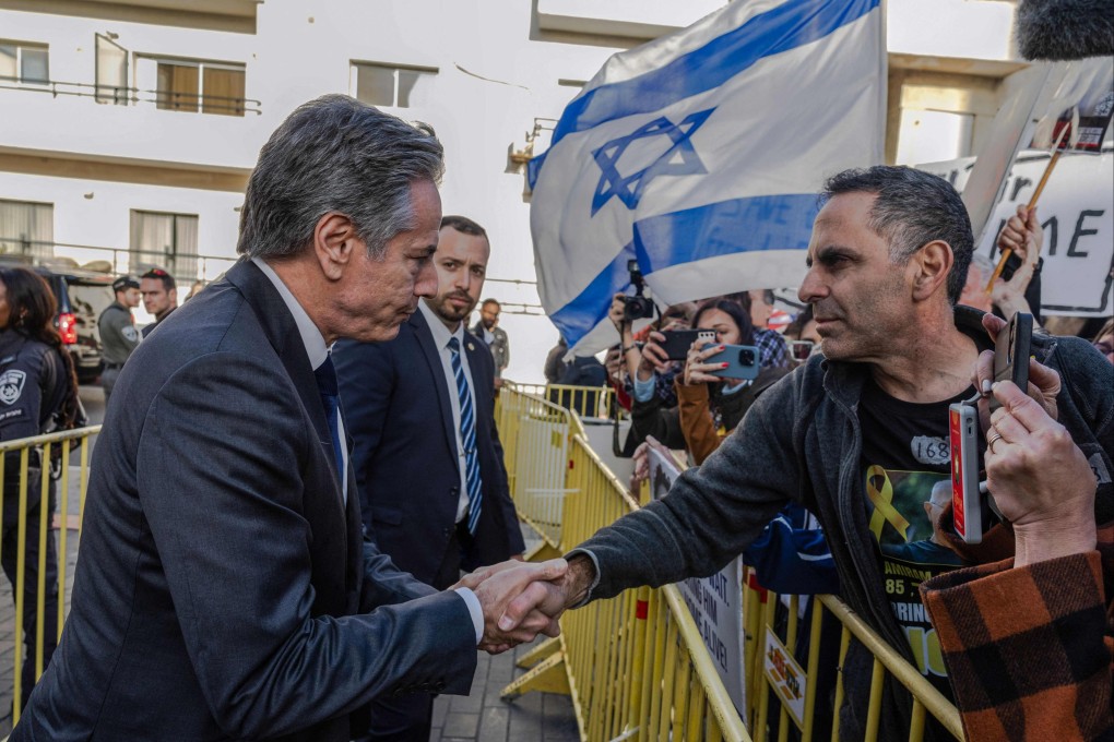 US Secretary of State Antony Blinken speaks to relatives and supporters of Israelis held hostage in Gaza during a stop in Tel Aviv on Friday. Photo: AFP