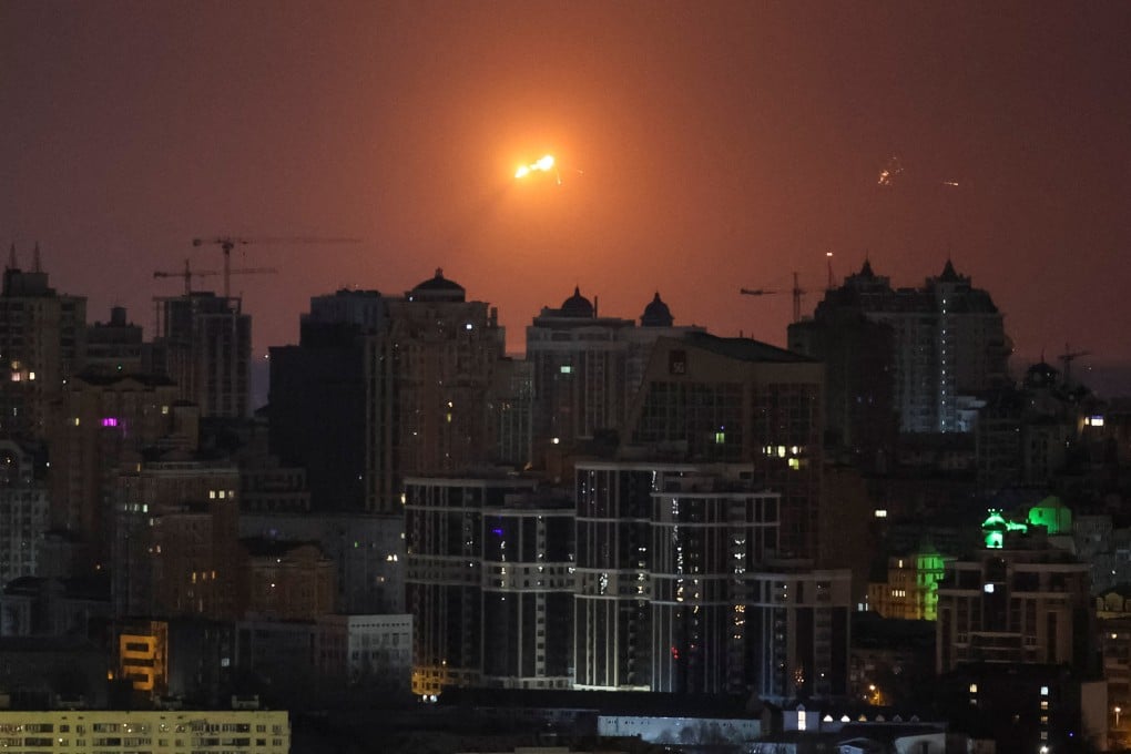 A missile explodes in the sky over Kyiv during a Russian missile strike on the Ukrainian capital early on Sunday. Photo: Reuters