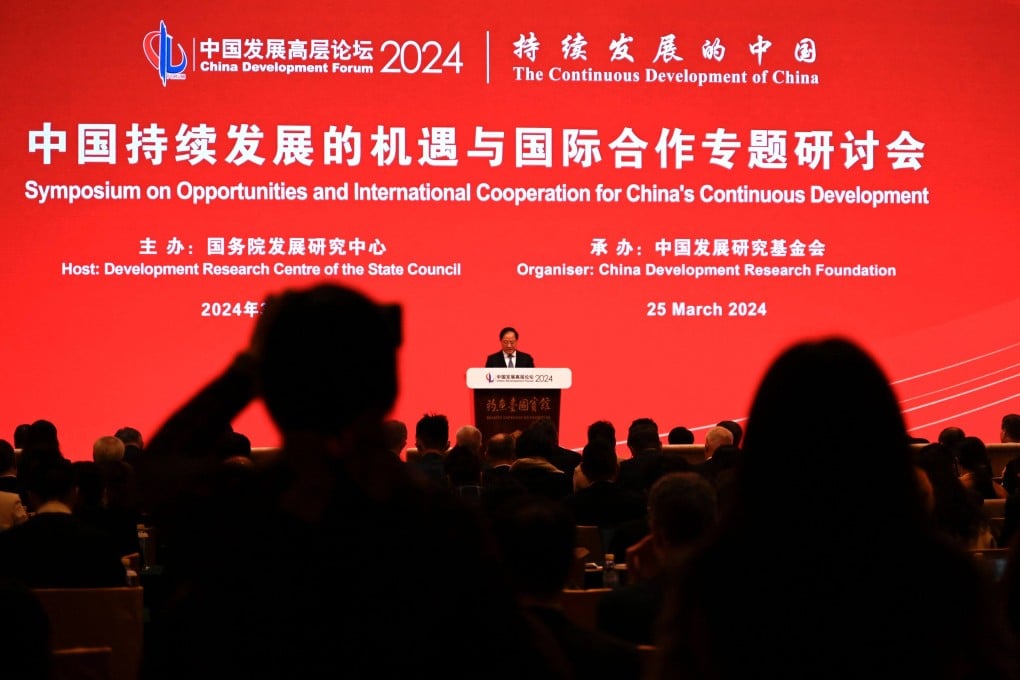 Jin Zhuanglong, minister of industry and information technology, speaks during a symposium on Monday at the China Development Forum. Photo: AFP