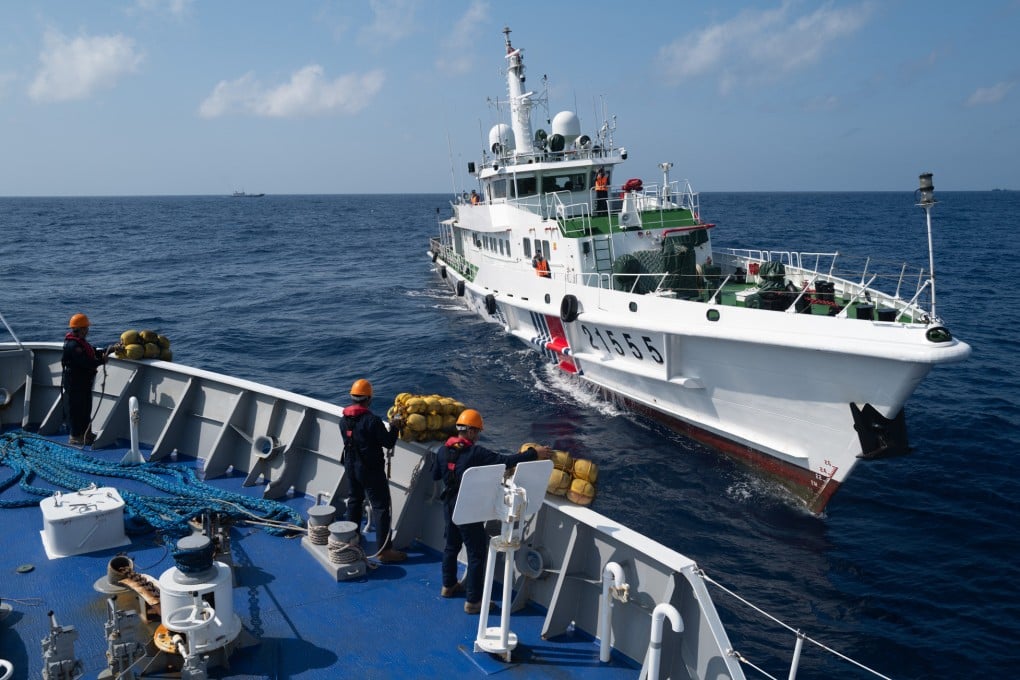 Chinese Coast Guard vessels water cannoned the civilian supply boat Unaizah May 4 on March 23 during a regular resupply mission at Ayungin Shoal. Photo: Jeoffrey Maitem