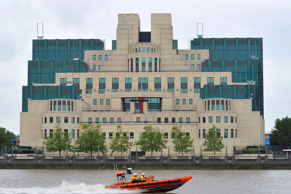 A motorboat passes by the MI6 building in London August 2010. Photo: Reuters