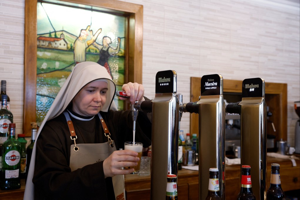 Sister Misericordia serves beer at the Amaren Etxea (Mother’s House) bar, at the Estibaliz Sanctuary in Villafranca de Estibaliz, northern Spain on Monday. Photo: Reuters