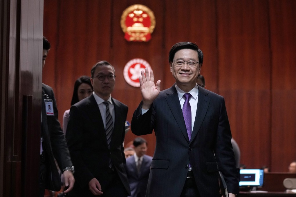 Chief Executive John Lee (right) has urged the public not to attempt any behaviour or activities that endanger national security. Photo: Elson Li