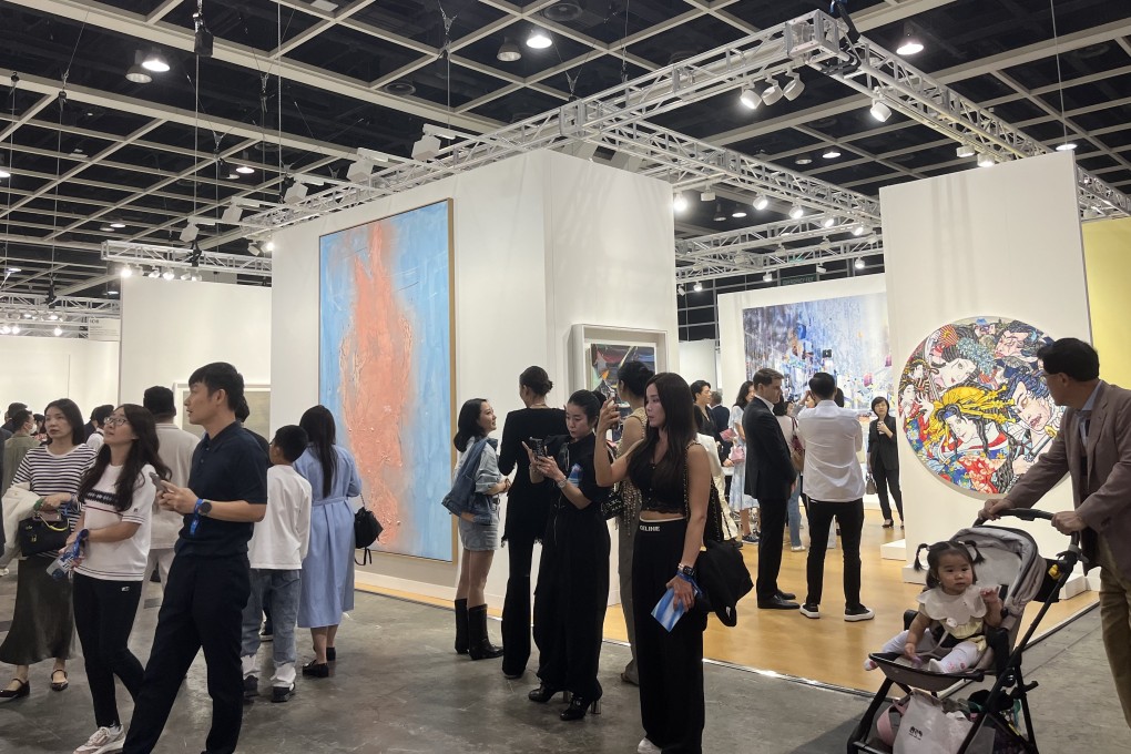 VIPs attend the opening day of the Art Basel Hong Kong contemporary art fair at the Hong Kong Convention and Exhibition Centre. The fair has returned to its pre-pandemic scale, with 242 galleries from 40 countries and territories exhibiting. Photo: Mabel Lui