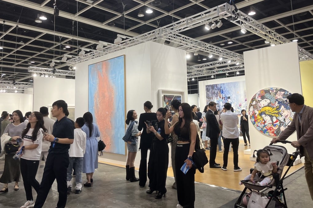 VIPs attend the opening day of the Art Basel Hong Kong contemporary art fair at the Hong Kong Convention and Exhibition Centre. The fair has returned to its pre-pandemic scale, with 242 galleries from 40 countries and territories exhibiting. Photo: Mabel Lui
