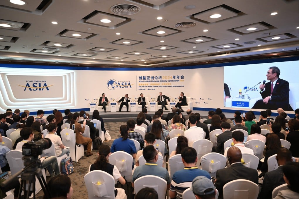 Former Chinese trade official Long Yongtu (second from left on panel) spoke at the Boao Forum for Asia on Tuesday and accused Washington of “dismantling the system” of trade that it helped build. Photo: Getty Images