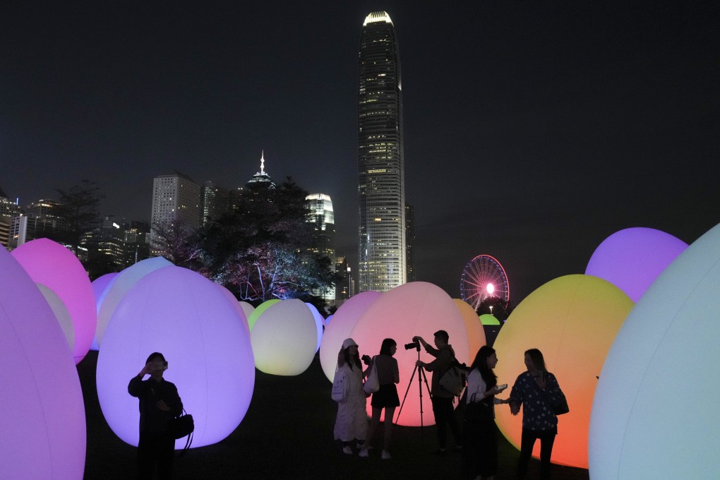 Revellers can take in the sights of the “Continuous” exhibition at Victoria Harbour during the Easter break. Photo: Sam Tsang