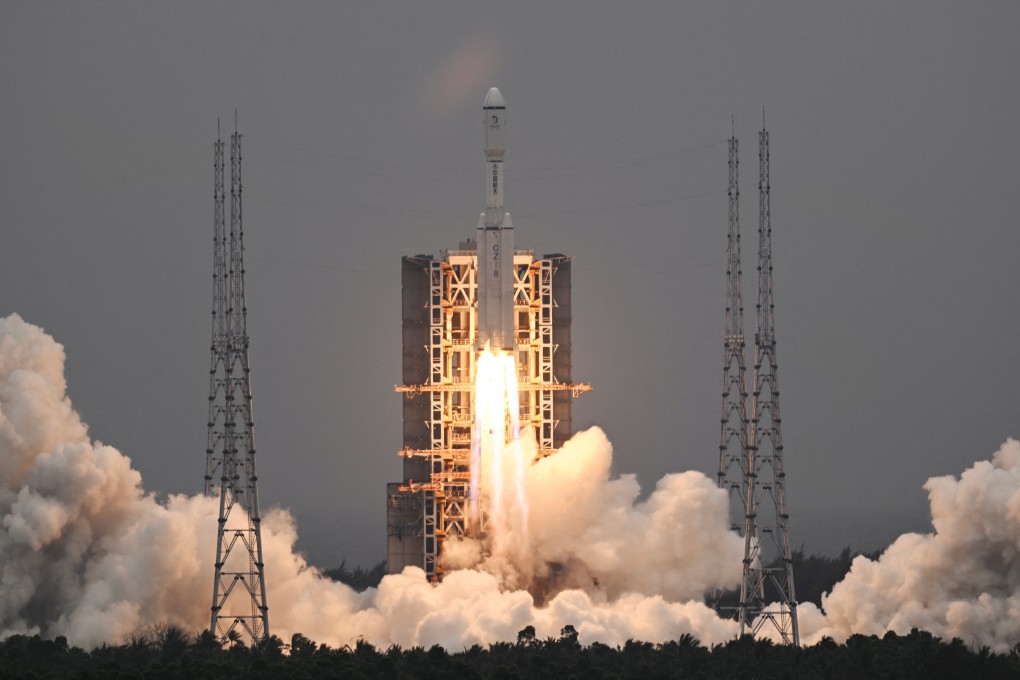 A Long March-8 rocket, carrying the relay satellite Queqiao-2 for Earth-moon communications, blasts off at the Wenchang Space Launch Centre on March 20. Photo: Reuters