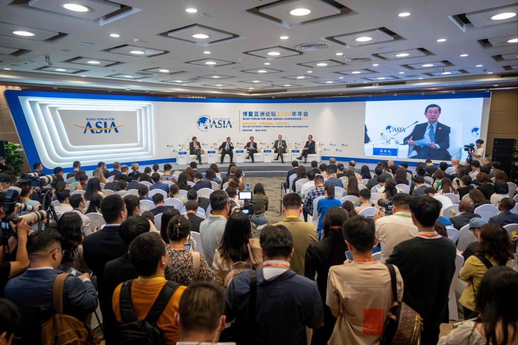 Journalists attend an event of the Boao Forum for Asia. Photo: AFP