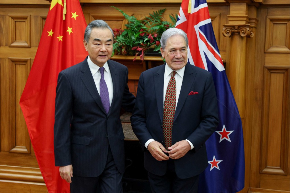 New Zealand’s Foreign Minister Winston Peters (right) with his Chinese counterpart Wang Yi in Wellington on March 18. Photo: AFP