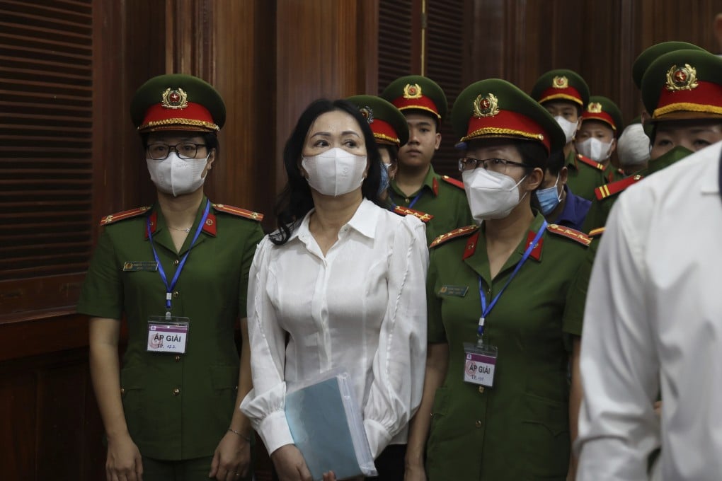 Vietnamese real estate tycoon Truong My Lan is escorted into a courtroom in Ho Chi Minh city, on March 5. Photo: AP