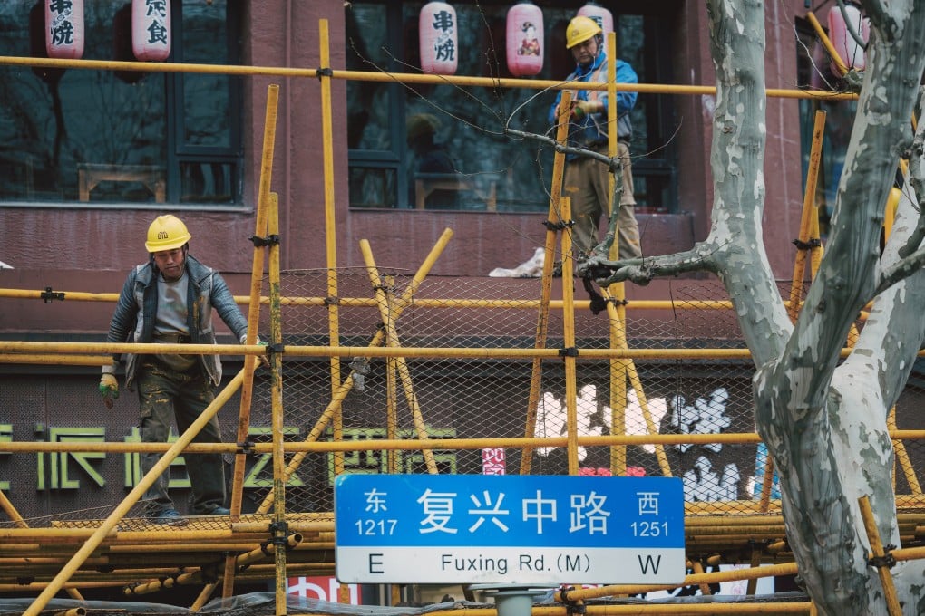 Labourers work on a construction site in Shanghai on March 27. According to the National Bureau of Statistics, China’s industrial firms saw a 10.2 per cent year-on-year increase in profits during the first two months of 2024, suggesting the Chinese economy is starting to recover, thanks to Beijing’s support measures. Photo: EPA-EFE