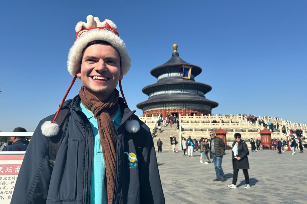 A German tourist visits the Temple of Heaven in Beijing on March 20. Since December, China has allowed travellers from Germany to enter without a visa for 15 days for business, tourism, family visits and transit. Photo: Xinhua