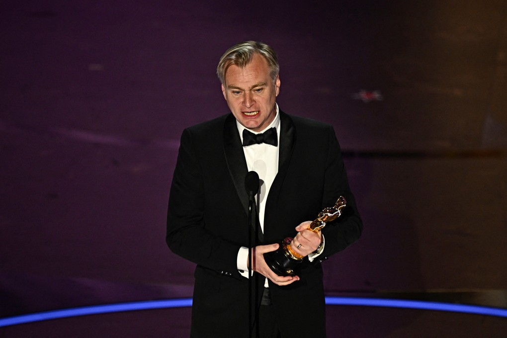 Christopher Nolan accepts the best director Oscar for Oppenheimer in Hollywood, California on March 10. Photo: AFP / Getty Images / TNS