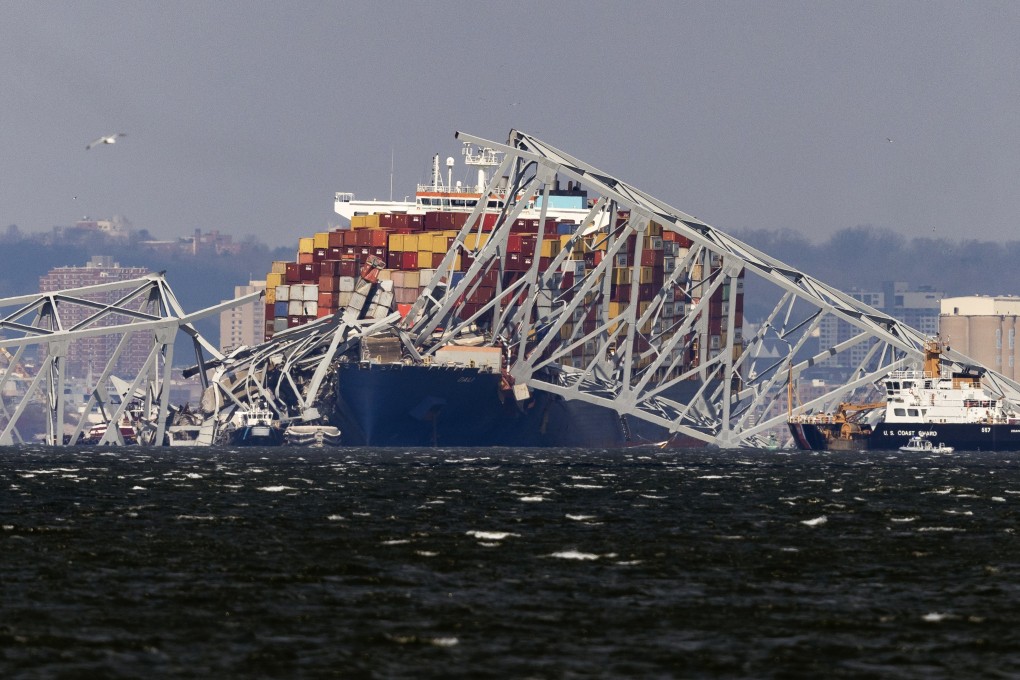 The cargo vessel Dali lies under a toppled section of the Francis Scott Key Bridge in Baltimore, Maryland, on Friday. Photo: EPA-EFE