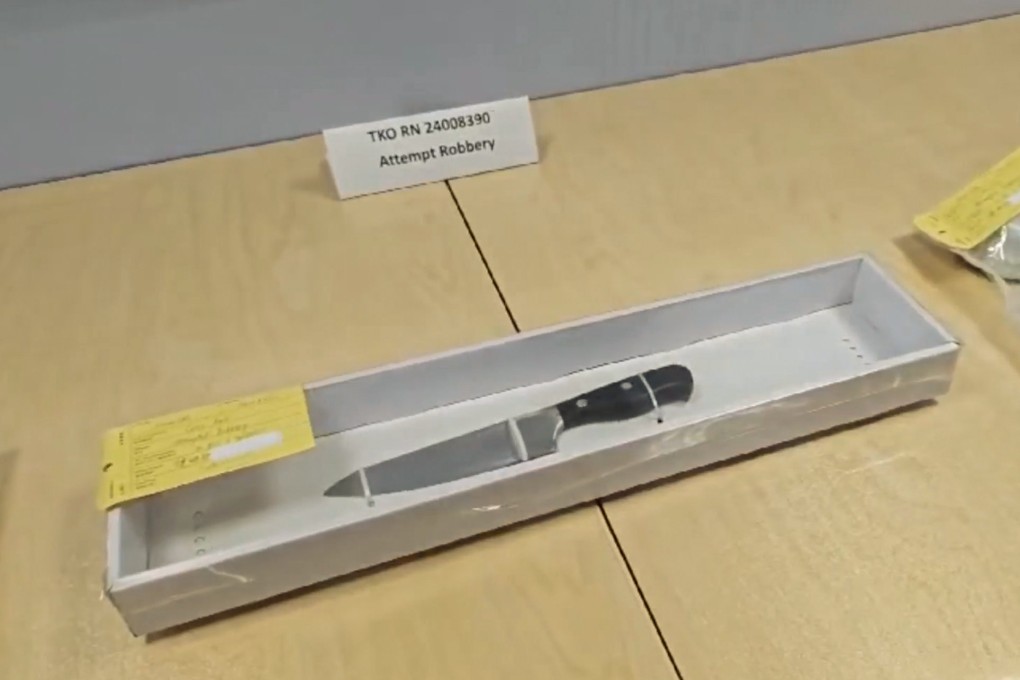 Police display a knife seized during their investigation into the attempted robbery in Tseung Kwan O. Photo: Handout