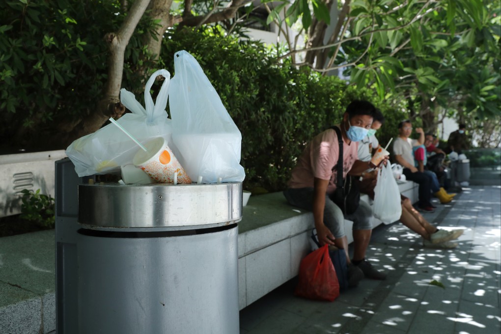 Lunch boxes sit in a rubbish bin in Hong Kong’s Kwun Tong district in July 2020. Lack of clarity from the government and confusion among the public suggest a potential mess when the ban on single-use plastics and the city’s waste charging scheme come into effect. Photo: Edmond So