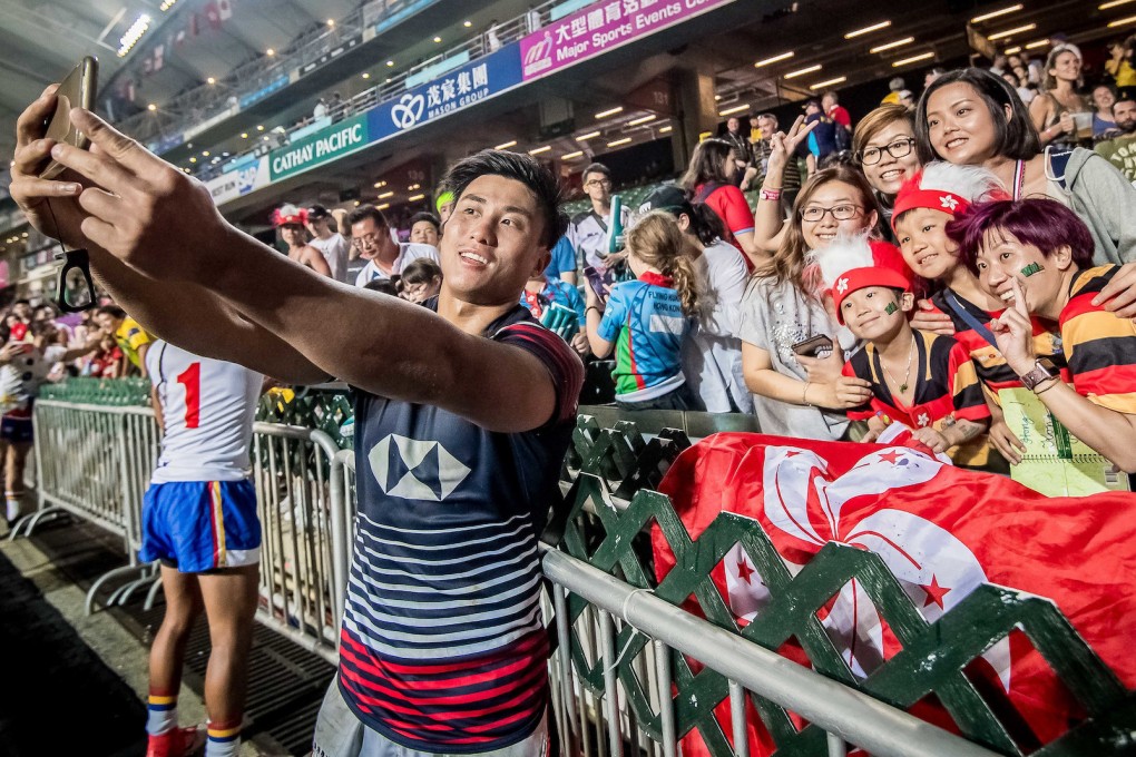Cado Lee takes a selfie with fans at the 2019 Sevens. Photo: Ike Images for Hong Kong Rugby Union