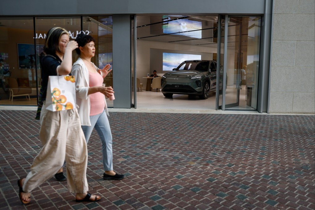 A Nio showroom in Beijing. On Monday, the EV maker, which traditionally does not lower the prices of its cars, said that drivers who replaced their petrol vehicles with its vehicles would receive a ‘subsidy’ of 10,000 yuan each. Photo: EPA-EFE