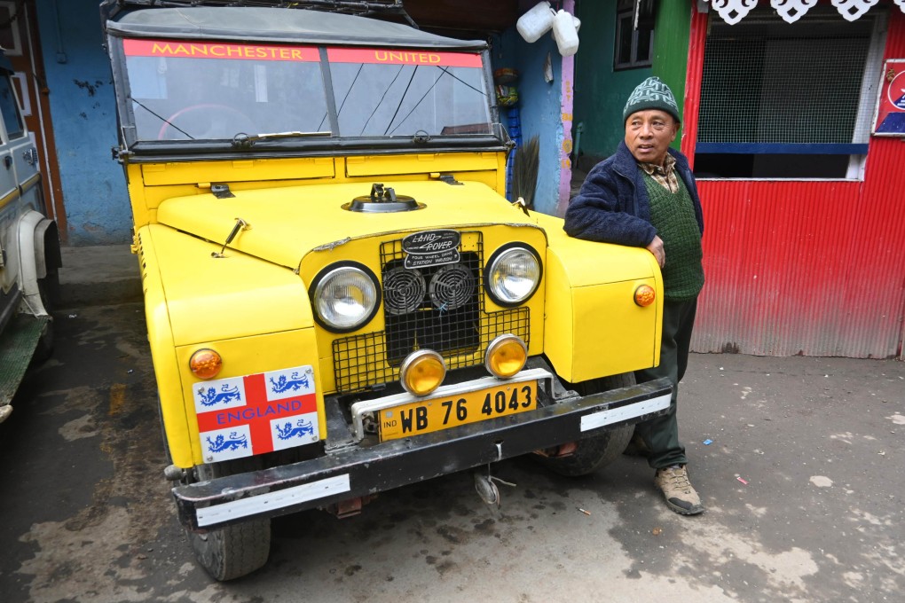 Pasang Tamang with his classic Land Rover in Manebhanjyang. The Indian town on the border with Nepal is home to many of the vintage vehicles, but owners face the possibility of their commercial use being phased out. Photo: Shail Desai