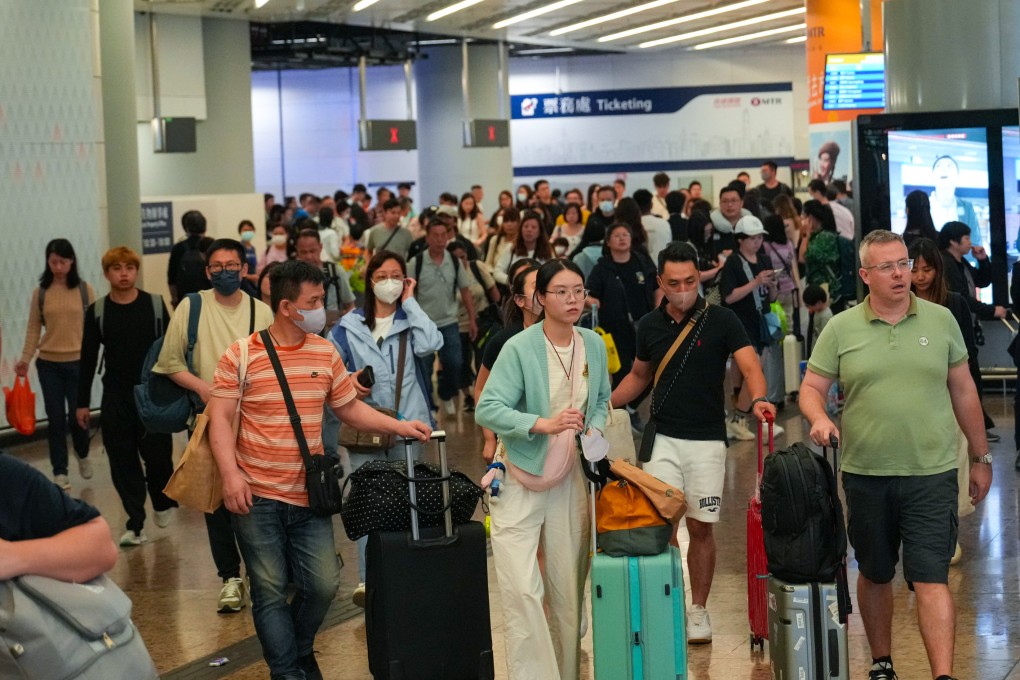 Travellers at West Kowloon station. Outbound trips by residents have risen 16 per cent during this year’s Easter break against 2018 levels. Photo: Sam Tsang