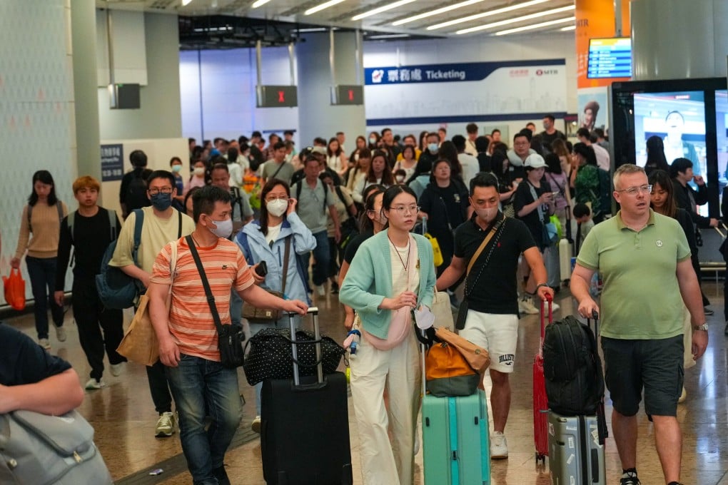 Travellers at West Kowloon station. Outbound trips by residents have risen 16 per cent during this year’s Easter break against 2018 levels. Photo: Sam Tsang