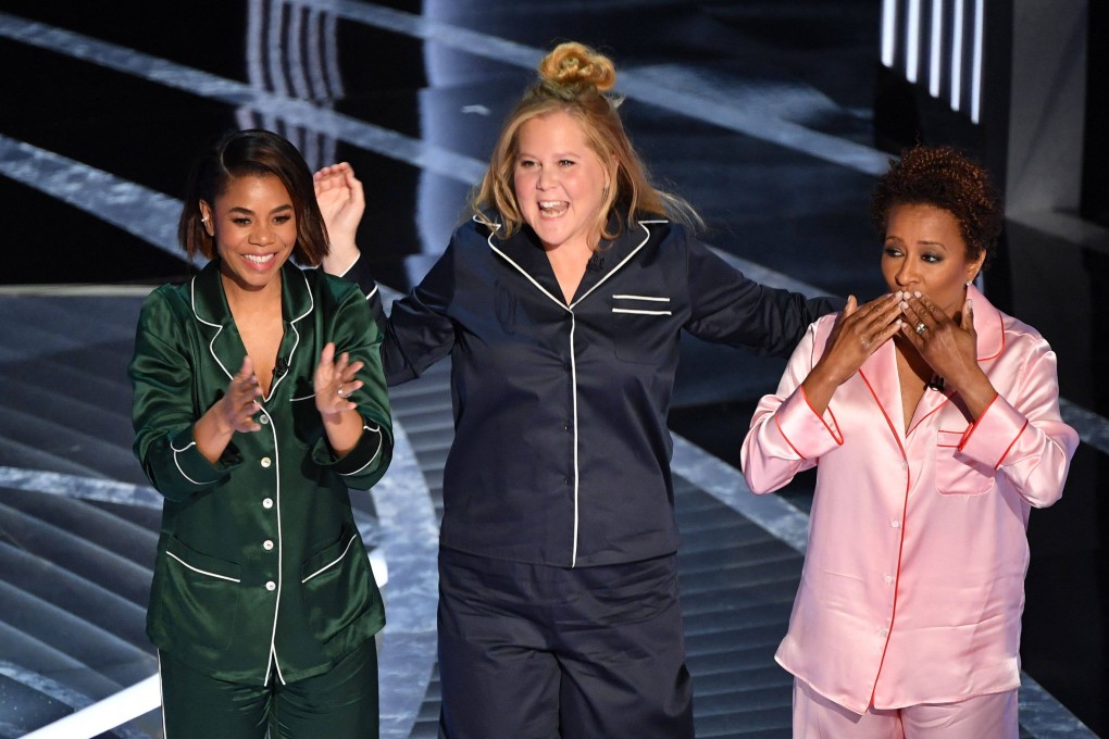 After reading online comments, US comedian Amy Schumer (pictured above, centre, at the Oscars ceremony in 2022) consulted a doctor about her puffy face, and discovered she had Cushing’s syndrome. Photo: AFP