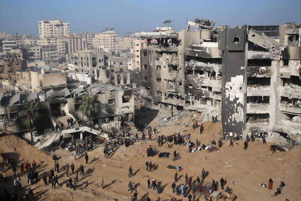 Palestinians inspect the damage at Gaza’s al-Shifa hospital after the Israeli military withdrew from the complex on April 1. Photo: AFP