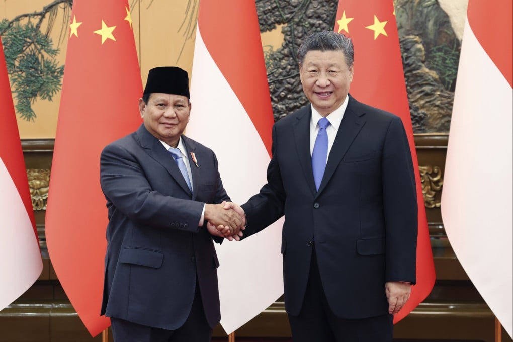 Indonesia’s president-elect Prabowo Subianto (left) shakes hands with Chinese President Xi Jinping at the Great Hall of the People in Beijing on Monday. Photo: Xinhua via AP