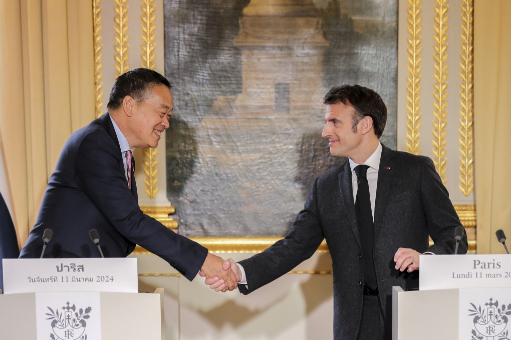 Thai Prime Minister Srettha Thavisin and French President Emmanuel Macron shake hands after a joint statement ahead of a working lunch at the Elysee Palace in Paris on March 11. Prime Minister Srettha Thavisin was in Europe for bilateral talks with France and Germany. Photo: AP