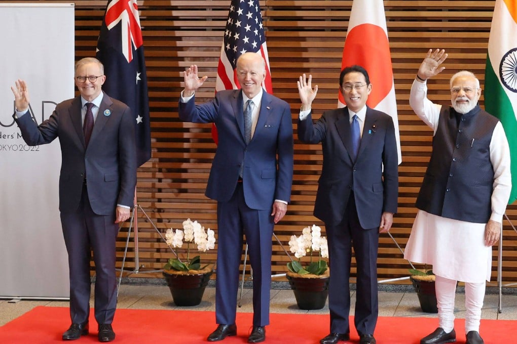 Australian Prime Minister Anthony Albanese, US President Joe Biden, Japanese Prime Minister Fumio Kishida, and Indian Prime Minister Narendra Modi wave before their Quad leaders’ meeting in Tokyo in May 2022. Photo: AFP