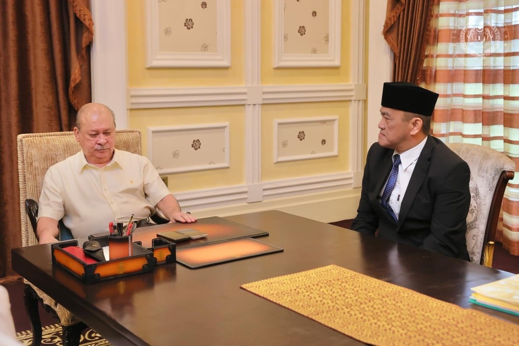 Malaysia’s king Sultan Ibrahim Iskandar with KK Super Mart founder Chai Kee Kan (right) at the national palace in Kuala Lumpur on Wednesday. Photo: Facebook/officialsultanibrahim