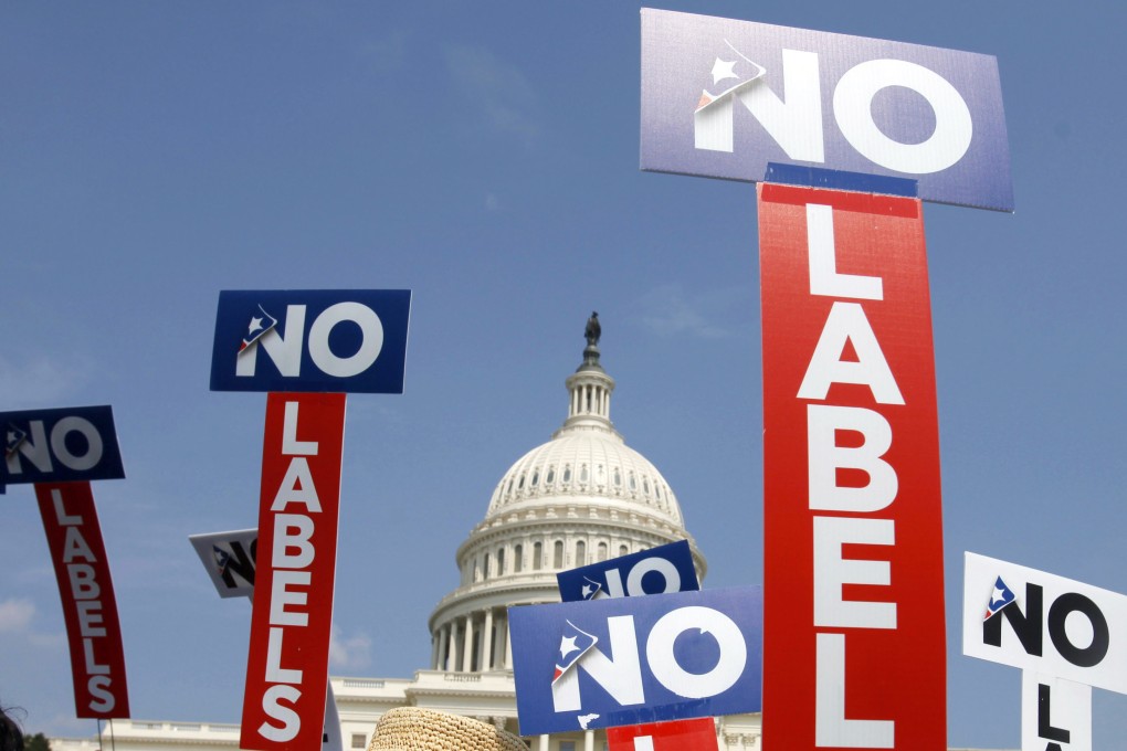 No Labels supporters hold signs during a rally on Capitol Hill in Washington in July 2013. Photo: AP