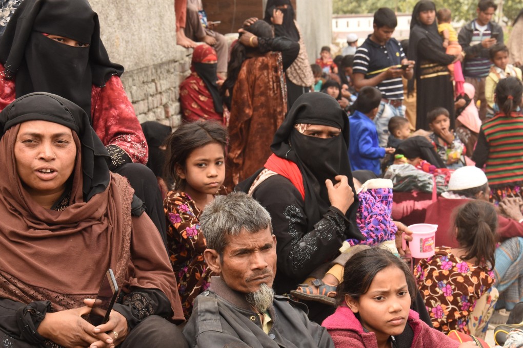 Rohingya Muslims from Myanmar gather outside a mosque in Jammu, the capital of Kashmir, India, on March 7, 2021. Photo: EPA-EFE