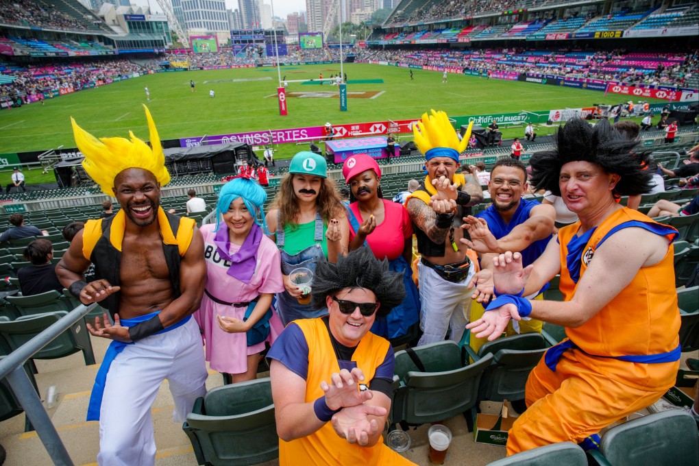 Fans dressing as cartoon characters on the first day of Hong Kong Sevens. Photo: Eugene Lee